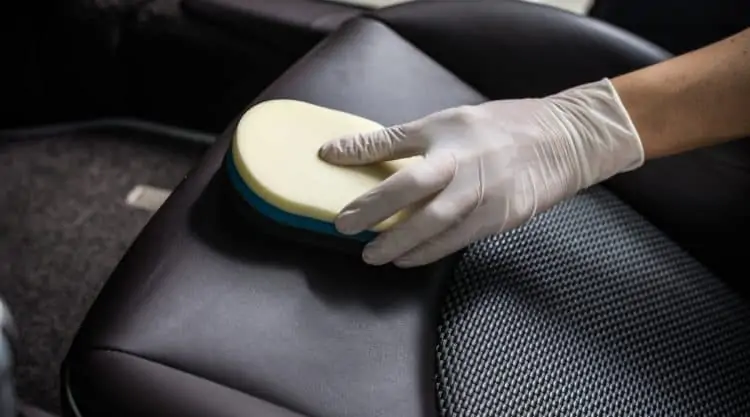 Cleaning Leather Seats with Sponge