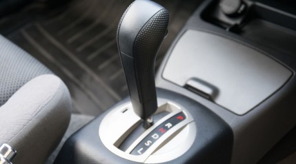 An automatic transmission gear knob with a neutral safety switch