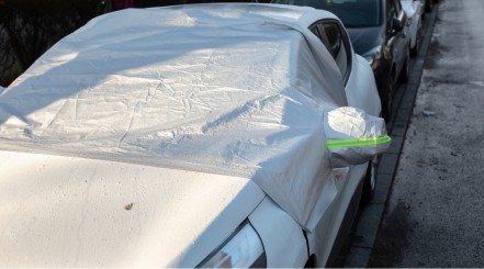 Car with Windshield Cover