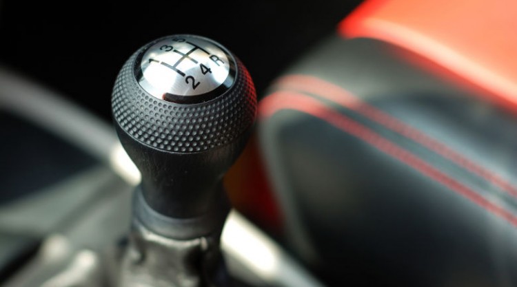 Close up of a shift knob in a sporty looking car