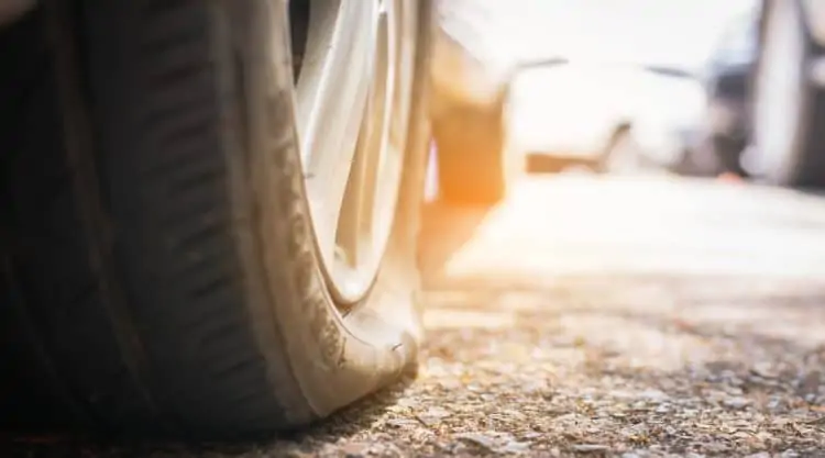 Car Driving on Flat Tire