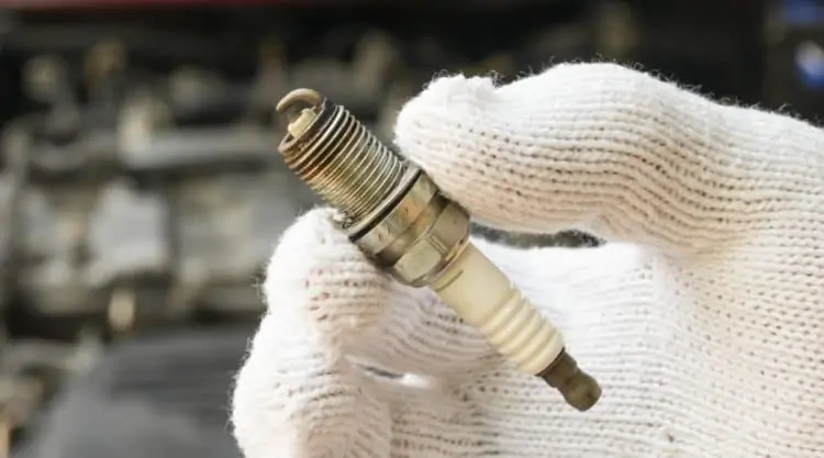 Car Sparkplug Getting Changed