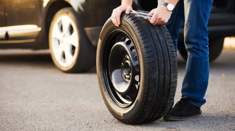 Changing Spare Tire on Car