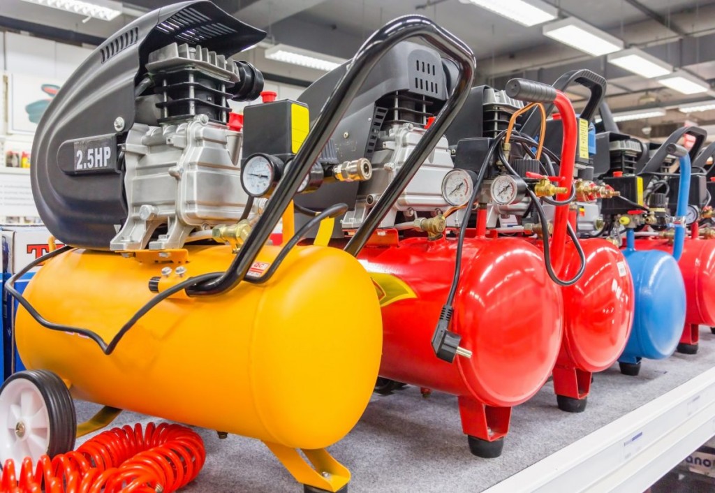 A selection of different colored air compressors