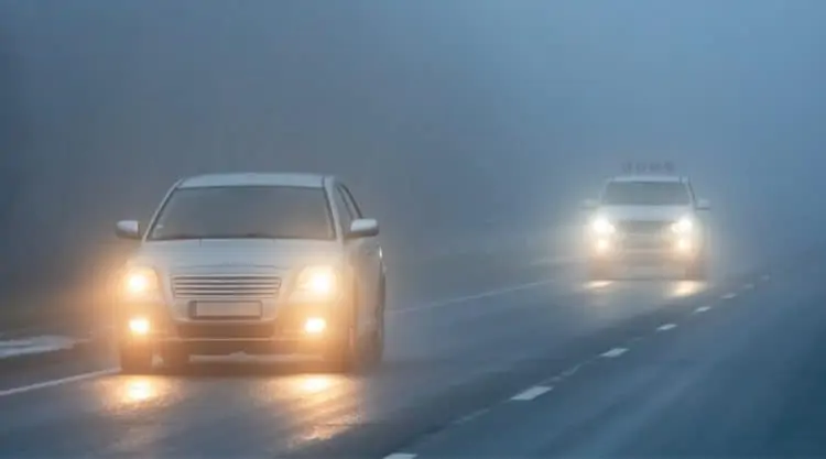 Cars Driving with Fog Lights Turned On