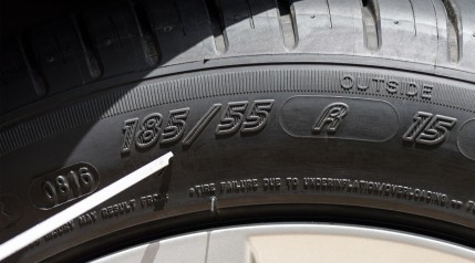 A close up picture of tires with size numbers on them