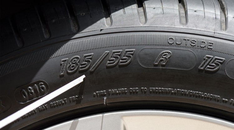A close up picture of tires with size numbers on them