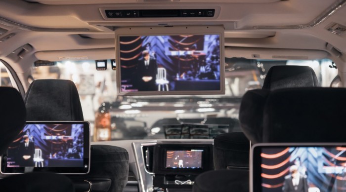 An in car entertainment system of three monitors