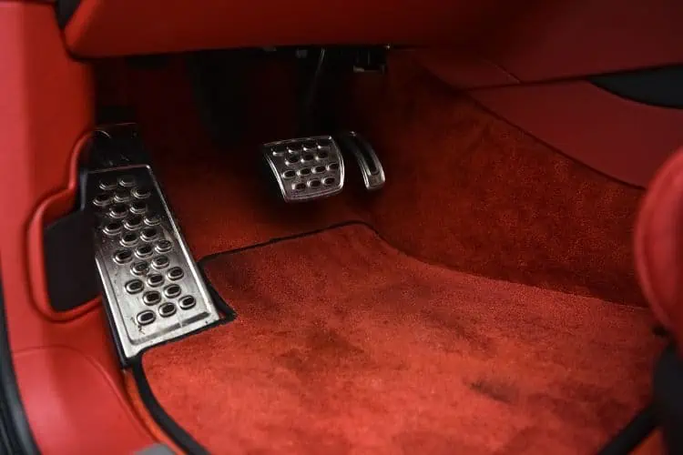 Red carpet car floor mat in car