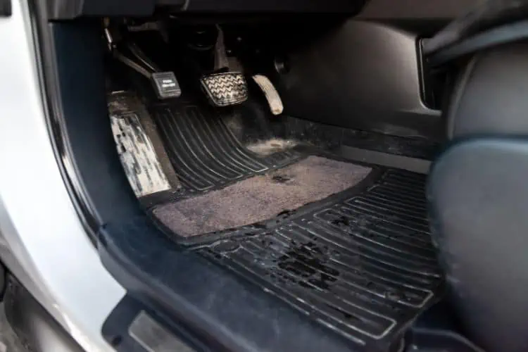 Stained and dirty car floor mat