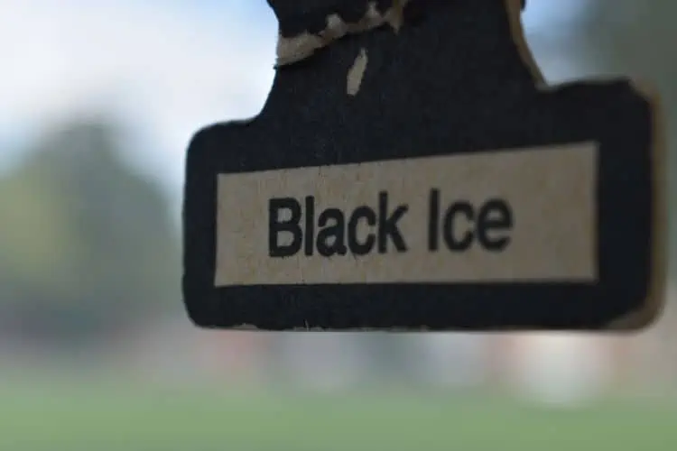 The base of a 'black ice' cardboard car air freshener