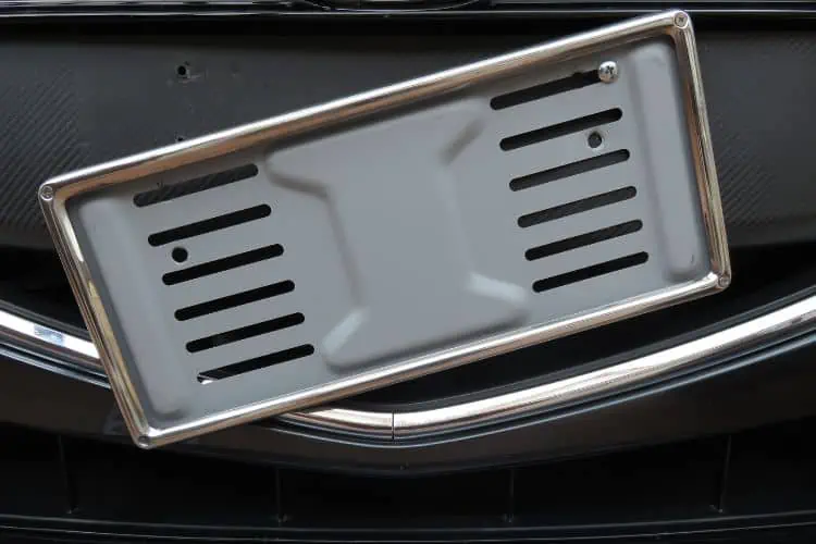 Half mounted license plate frame