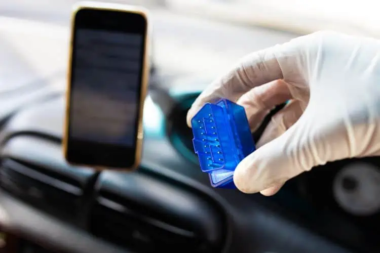 OBD II bluetooth scanner for a car that can connect to a smartphone for diagnostics 