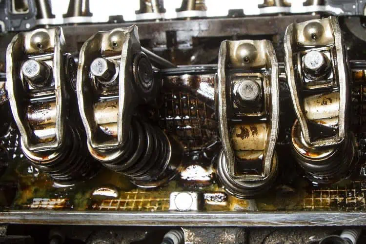 Rocker arms of high mileage engine showing sludge buildup