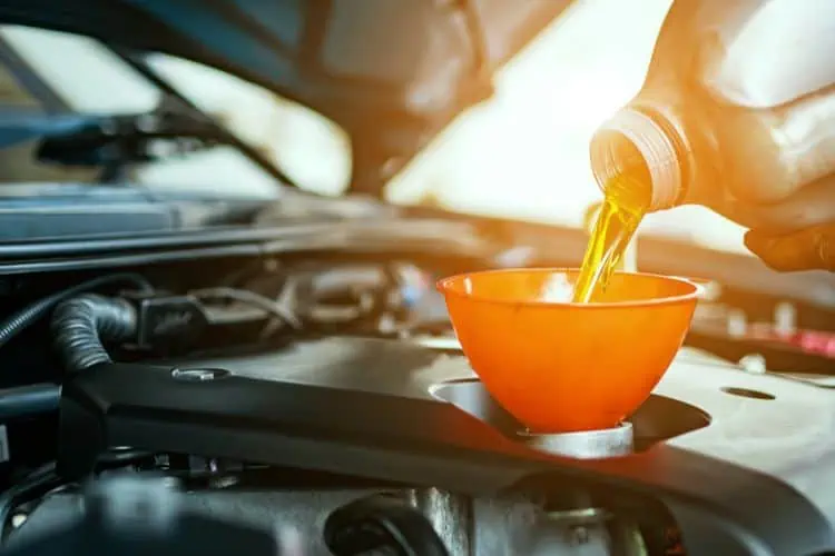 Mechanic changing oil