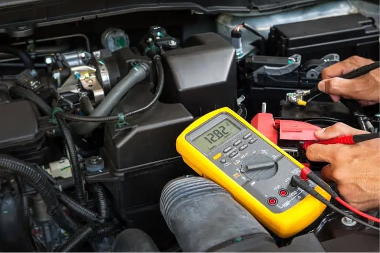 car battery connected to voltmeter