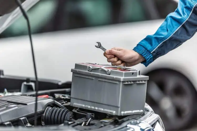 new battery being put in car