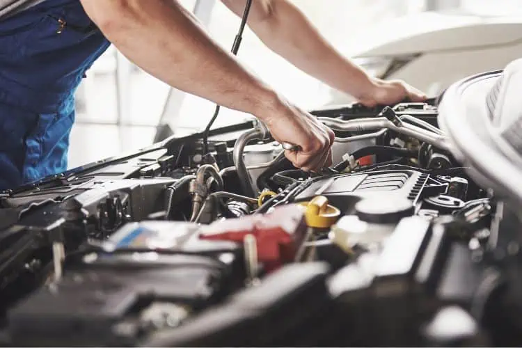 Mechanic working on engine